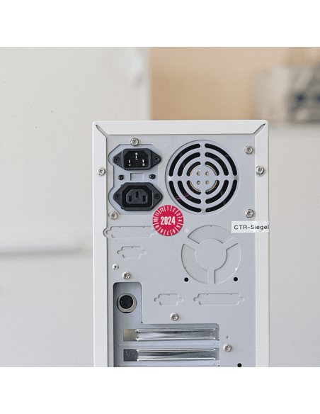 Keuringssticker met jaartal 2024 op rol, rood op apparaat