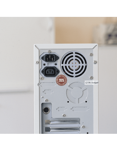 Keuringssticker met jaartal 2025 op rol, bruin op apparaat