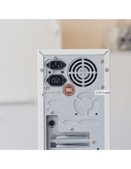 Keuringssticker met jaartal 2025 op rol, bruin op apparaat